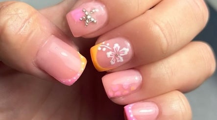 Floral-themed nail art at Millie Cooper Nails, Failsworth, England, GB, showcasing delicate designs and vibrant colors.