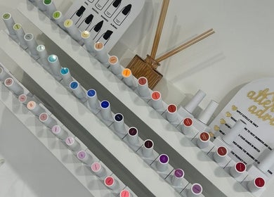 Nail polish display at Millie Cooper Nails in Failsworth, England, GB showcasing diverse color options.