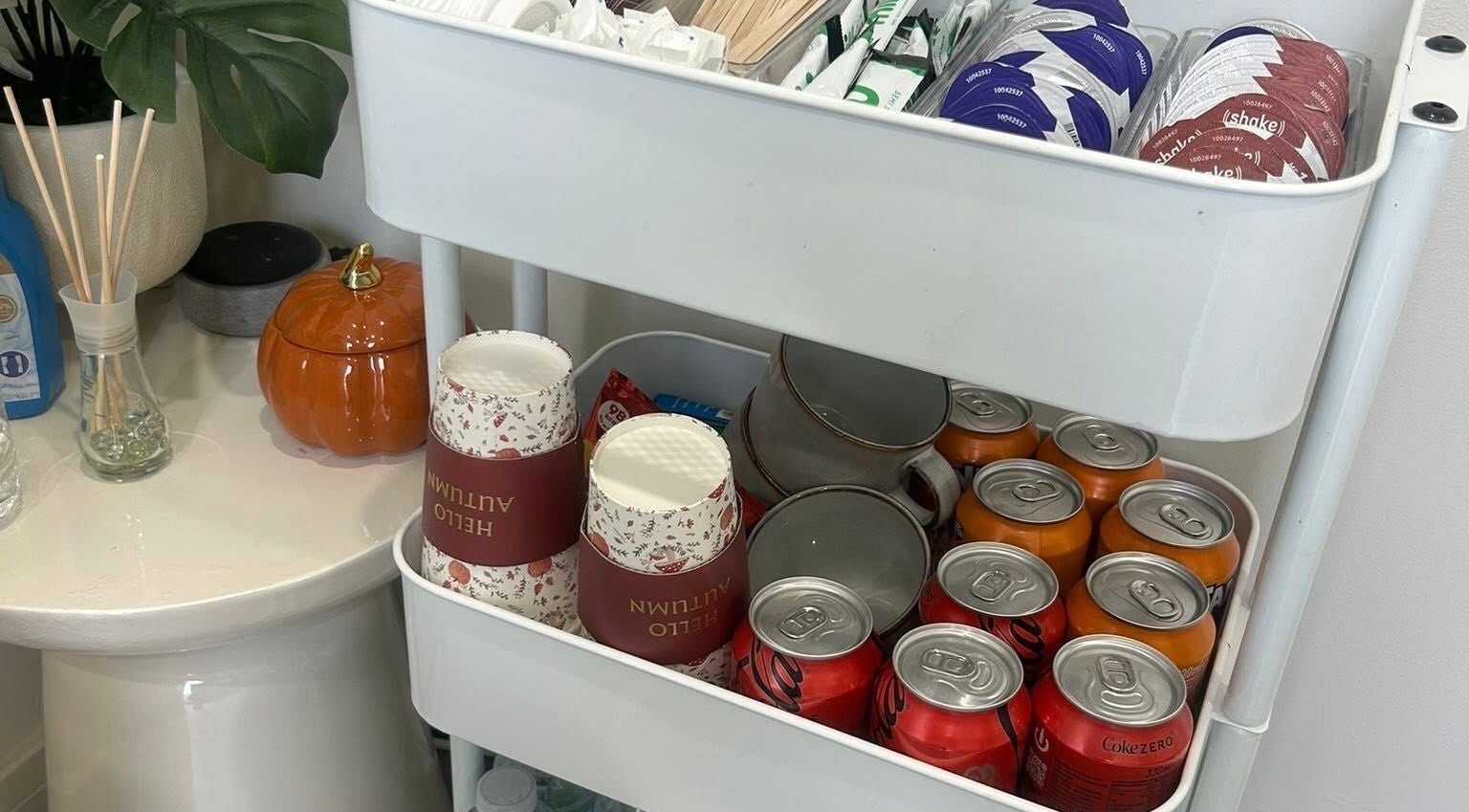 Refreshment station at Millie Cooper Nails, Failsworth, England, GB with drinks and autumn-themed decor.