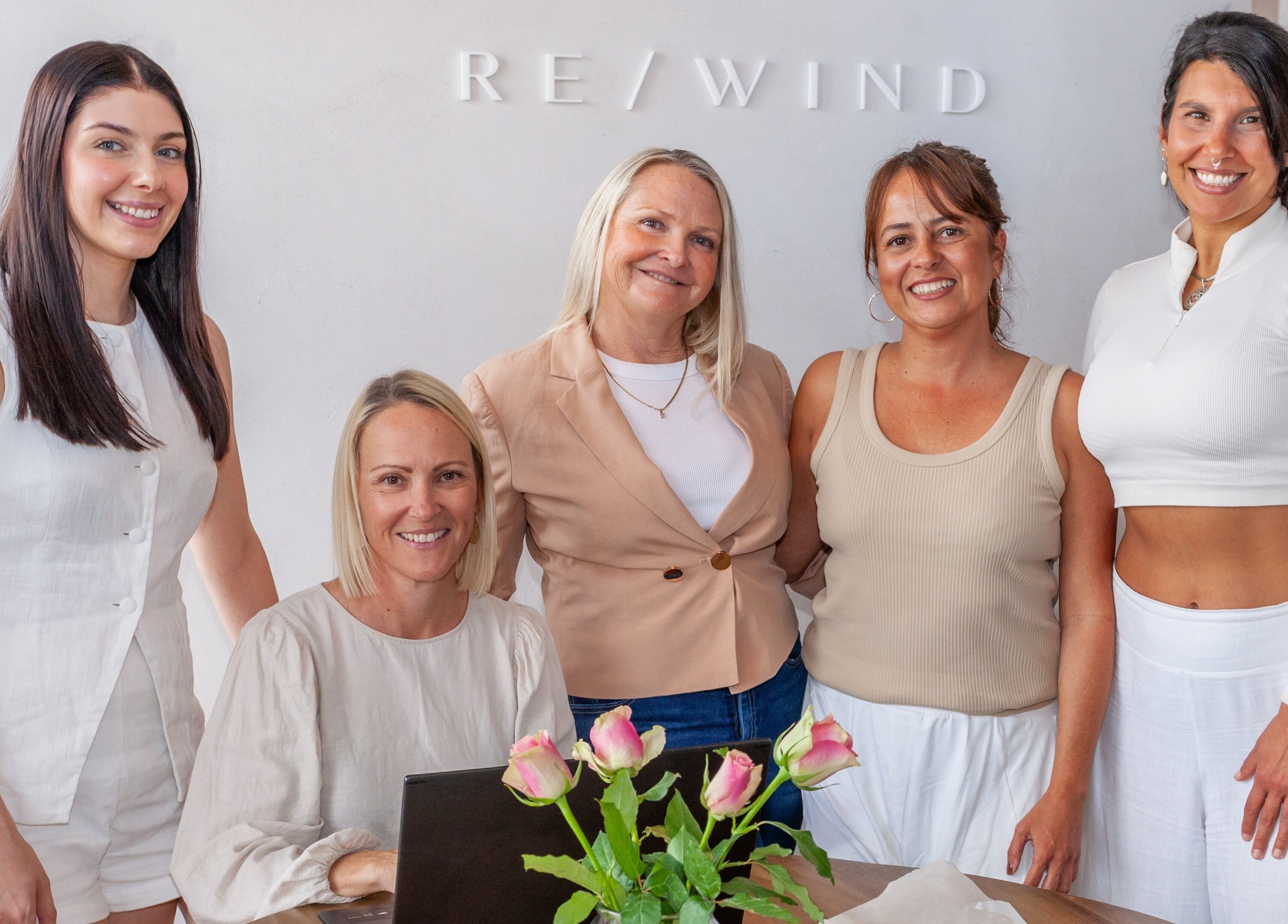 Friendly staff of Rewind at Currumbin Waters, Queensland, AU welcoming clients with smiles.