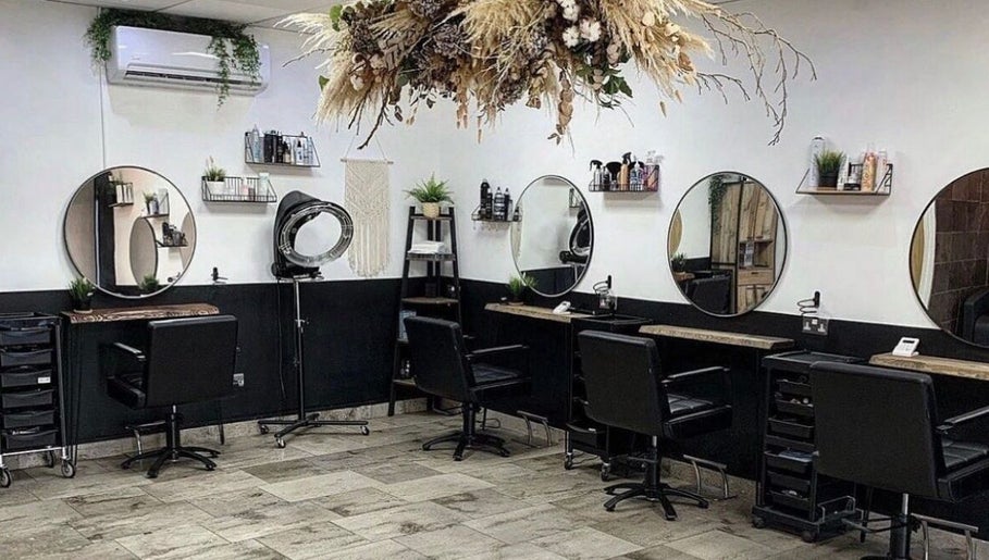 Elegant salon interior at Leah Robinson Nail Artist, Cardiff, Wales, GB featuring stylish workstations and decor.