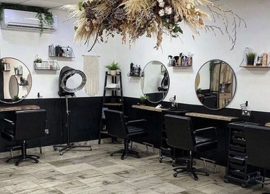 Elegant salon interior at Leah Robinson Nail Artist, Cardiff, Wales, GB featuring stylish workstations and decor.
