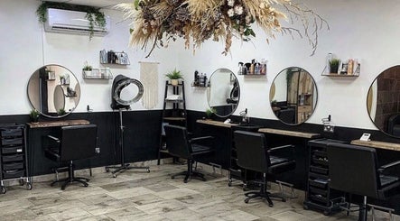 Elegant salon interior at Leah Robinson Nail Artist, Cardiff, Wales, GB featuring stylish workstations and decor.