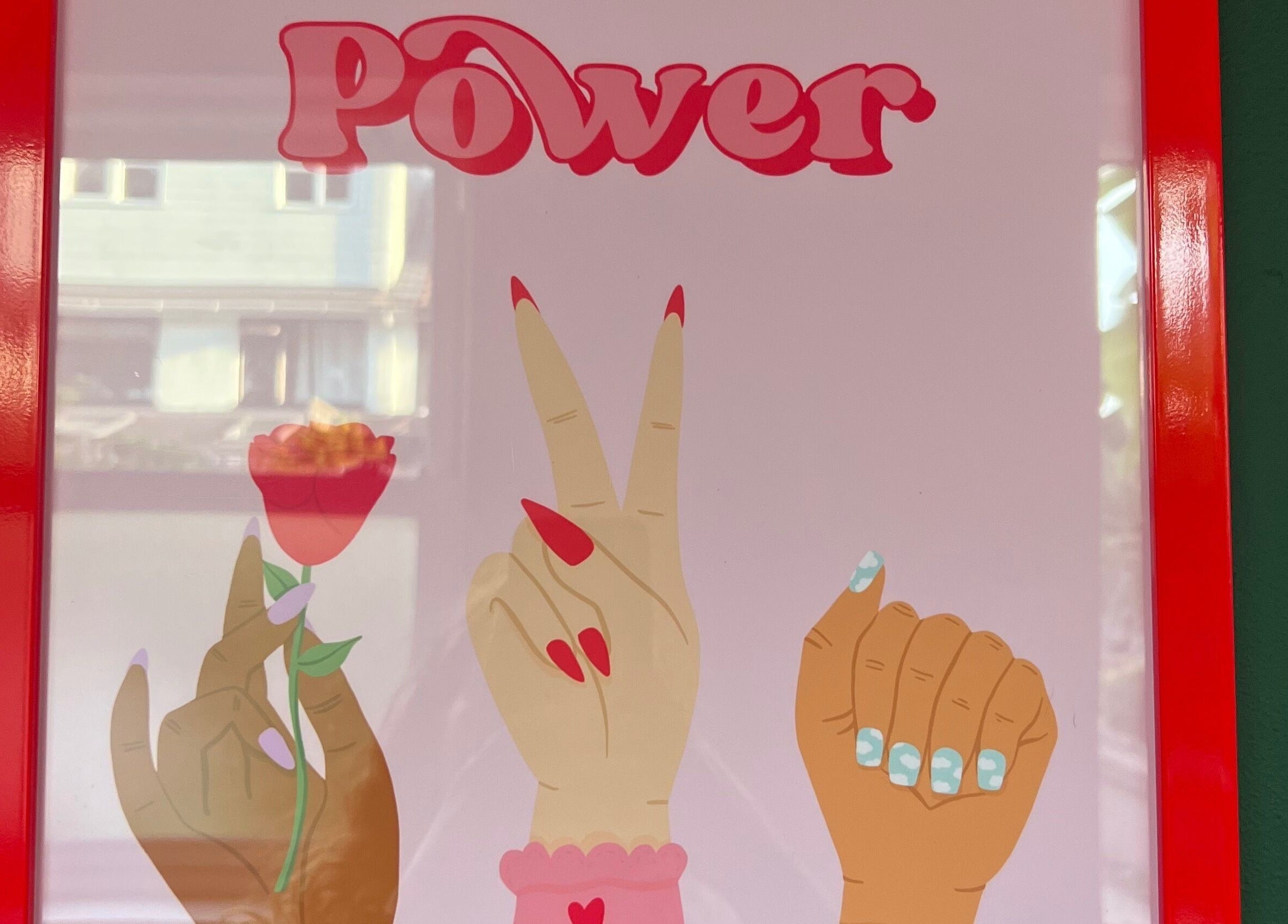 Colorful nail art poster with the word 'Power' at Pretty Please, Bristol, England, GB.