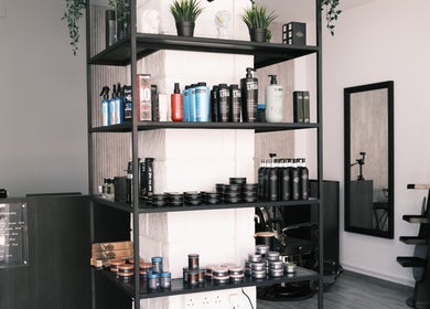 Chic product shelves at Level Up Barber Shop in Egkomi, Nicosia, CY showcasing premium grooming essentials.