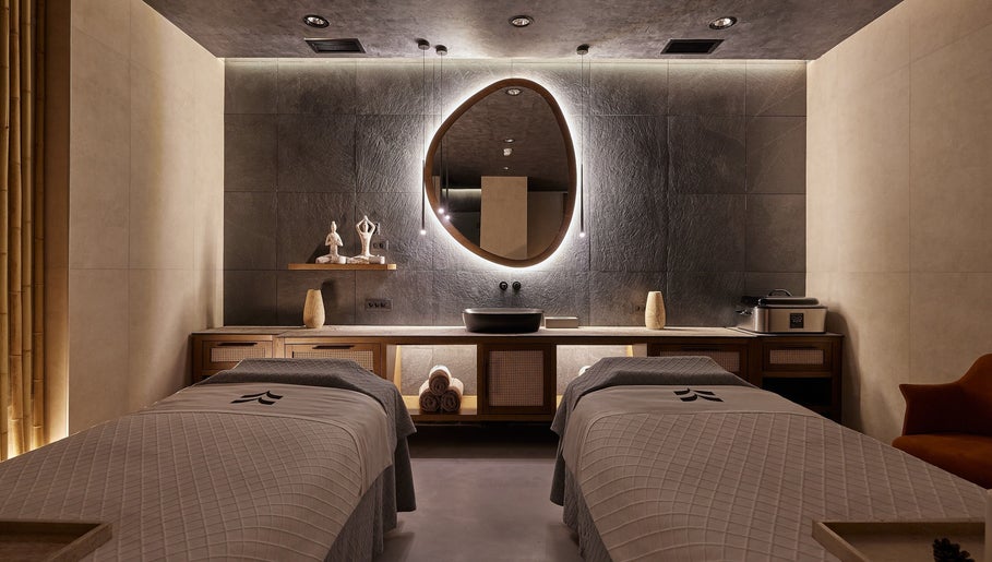 Elegant treatment room at Vassa Spa BOR Hotel by Karisma, Zlatibor, RS with ambient lighting and plush decor.