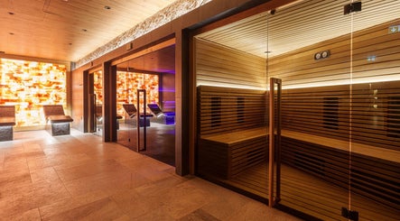 Luxurious sauna at Vassa Spa BOR Hotel by Karisma, Zlatibor, RS, featuring warm lighting and elegant design.