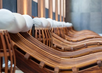 Luxurious wooden lounge chairs at Vassa Spa BOR Hotel by Karisma, Zlatibor, RS, inviting ultimate relaxation.
