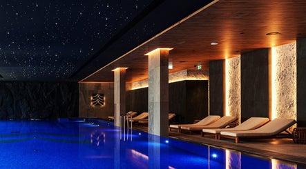Luxurious indoor pool at Vassa Spa BOR Hotel by Karisma, Zlatibor, Serbia, RS with starlit ceiling ambiance.