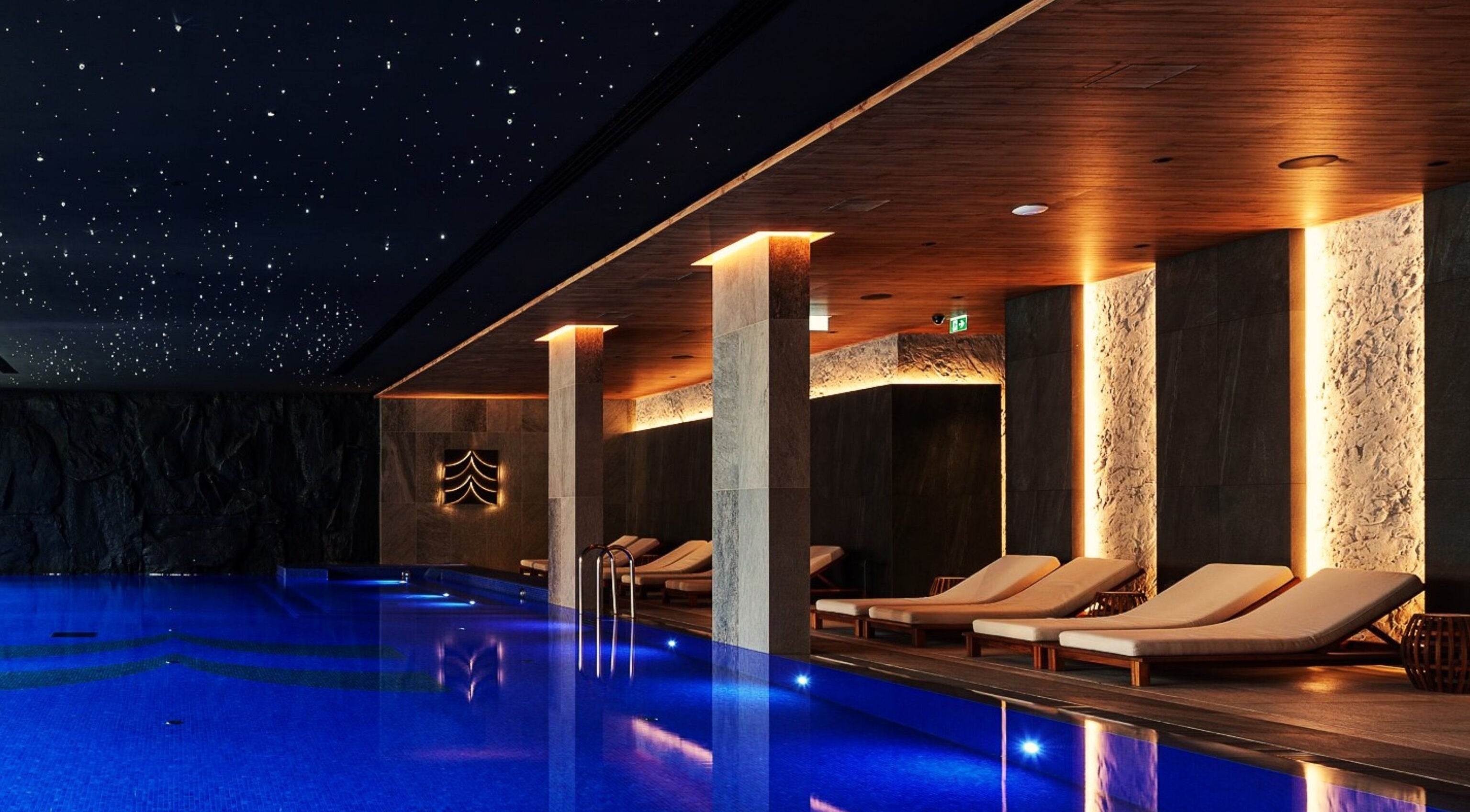 Luxurious indoor pool at Vassa Spa BOR Hotel by Karisma, Zlatibor, Serbia, RS with starlit ceiling ambiance.