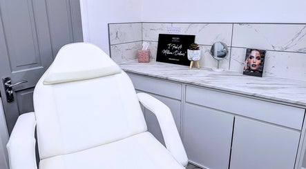 Luxurious treatment chair at New Age Aesthetics, Doncaster, England, GB, with elegant decor.