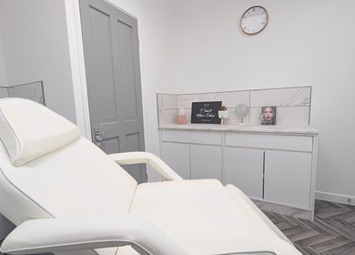 Elegant treatment room at New Age Aesthetics, Doncaster, England, GB, featuring a modern white chair.