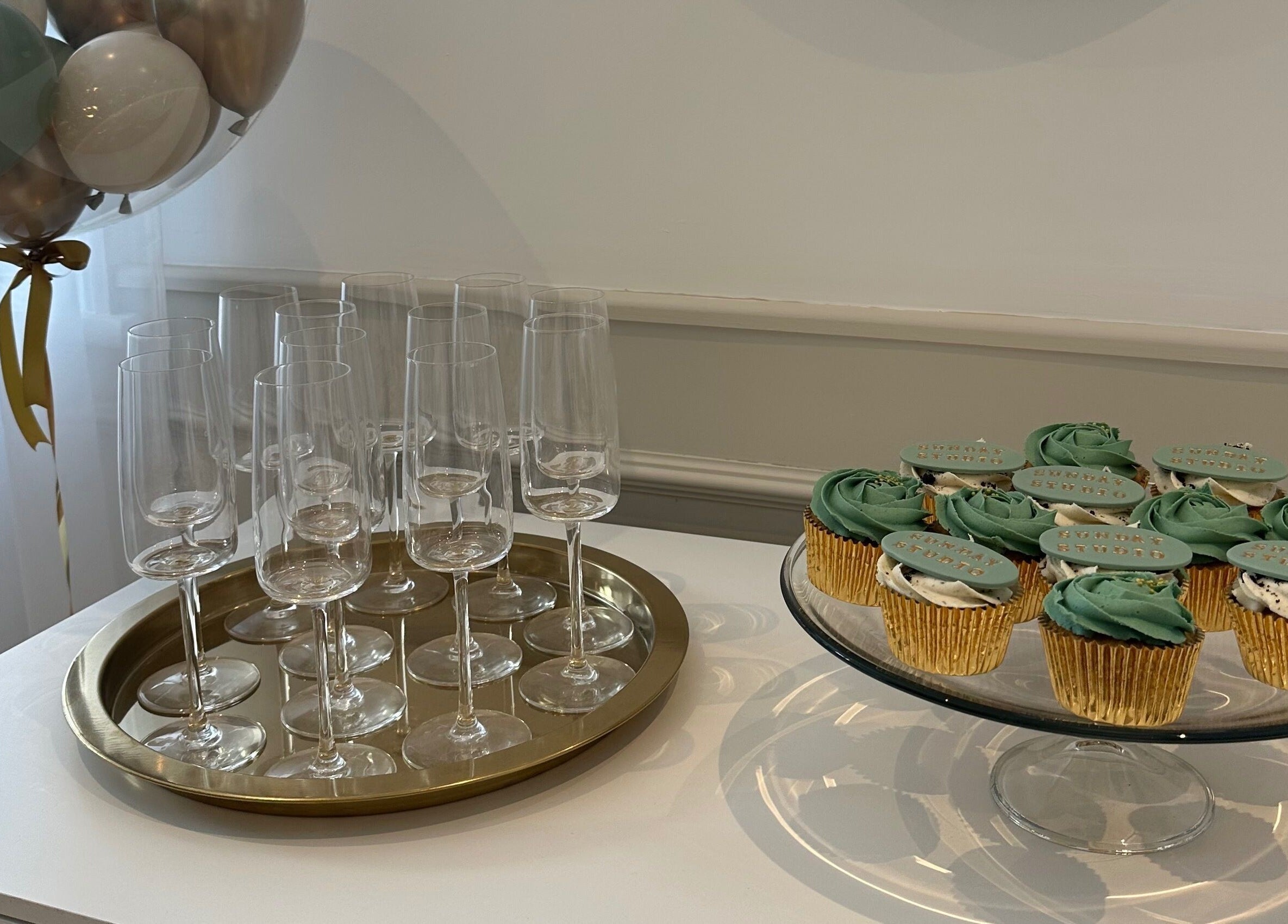 Elegant cupcake and champagne display at Sunday Studio, Horbury, Wakefield, England, GB.