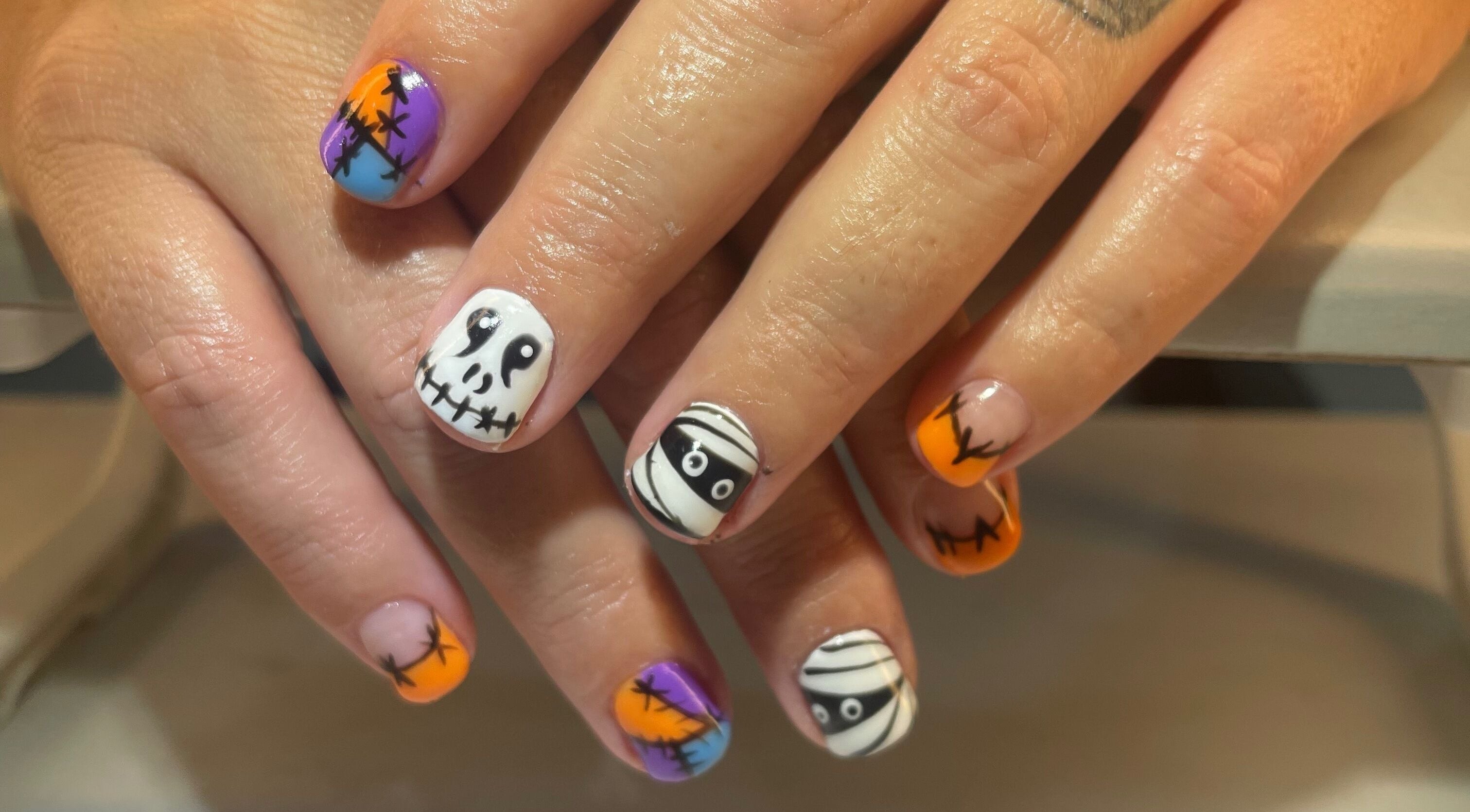 Creative Halloween-themed nail art at Palace Nails, Bowling Green, Kentucky, US offering unique designs.