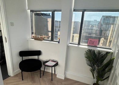 Relaxing corner with chair and plant at Feelin Fine UK, Milton Keynes, England, GB.