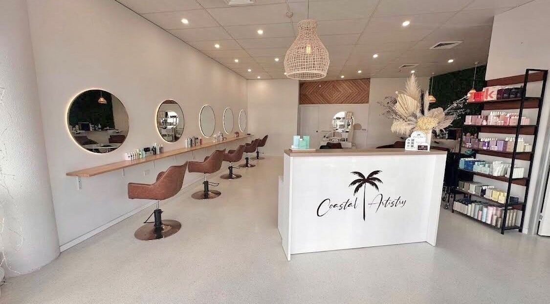 Elegant salon seating at La Petite Ann Nail, Mooloolaba, Queensland, AU with modern decor and ambient lighting.