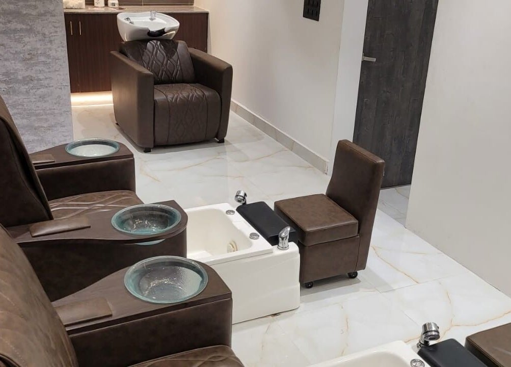 Elegant pedicure chairs at VOX - The Luxury Salon, Hyderabad, Telangana, IN.