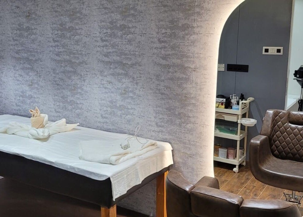Luxurious spa room at VOX - The Luxury Salon, Hyderabad, Telangana, IN, showcasing tranquility and elegance.