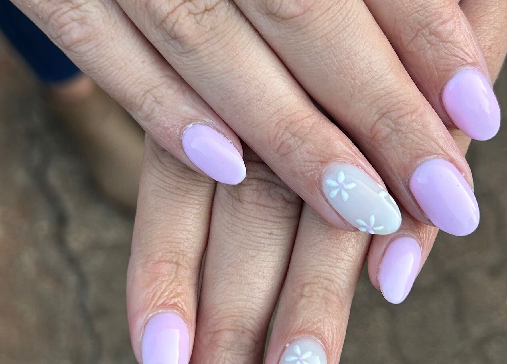 Stylish pastel nails at Blooming Nails, Tzaneen, Limpopo, ZA with delicate floral accents.