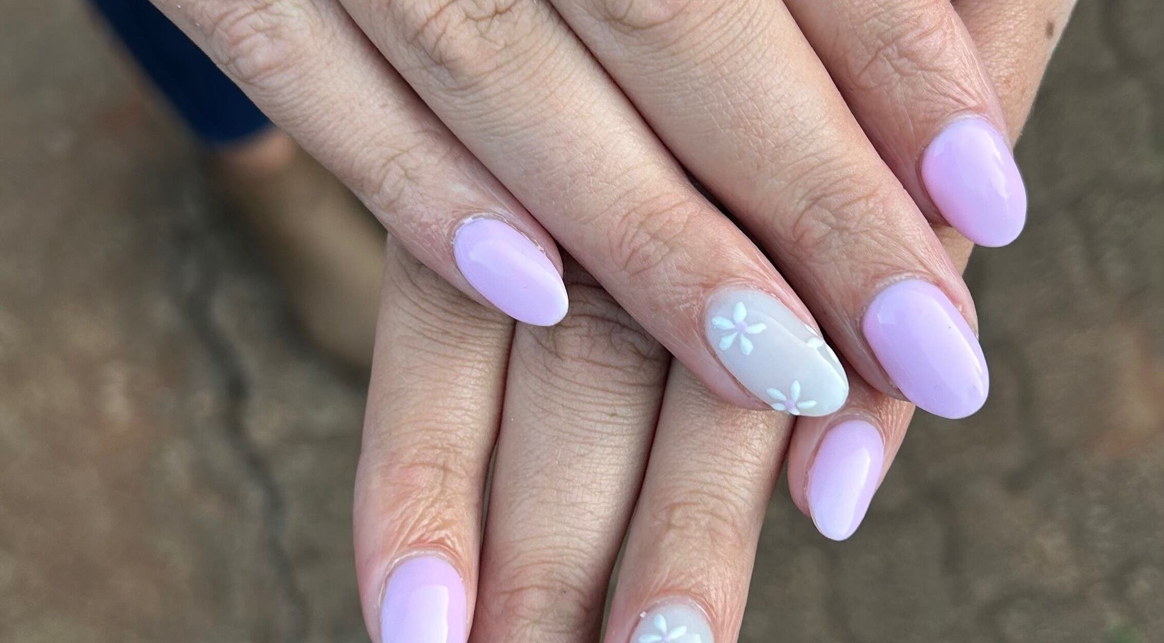 Stylish pastel nails at Blooming Nails, Tzaneen, Limpopo, ZA with delicate floral accents.