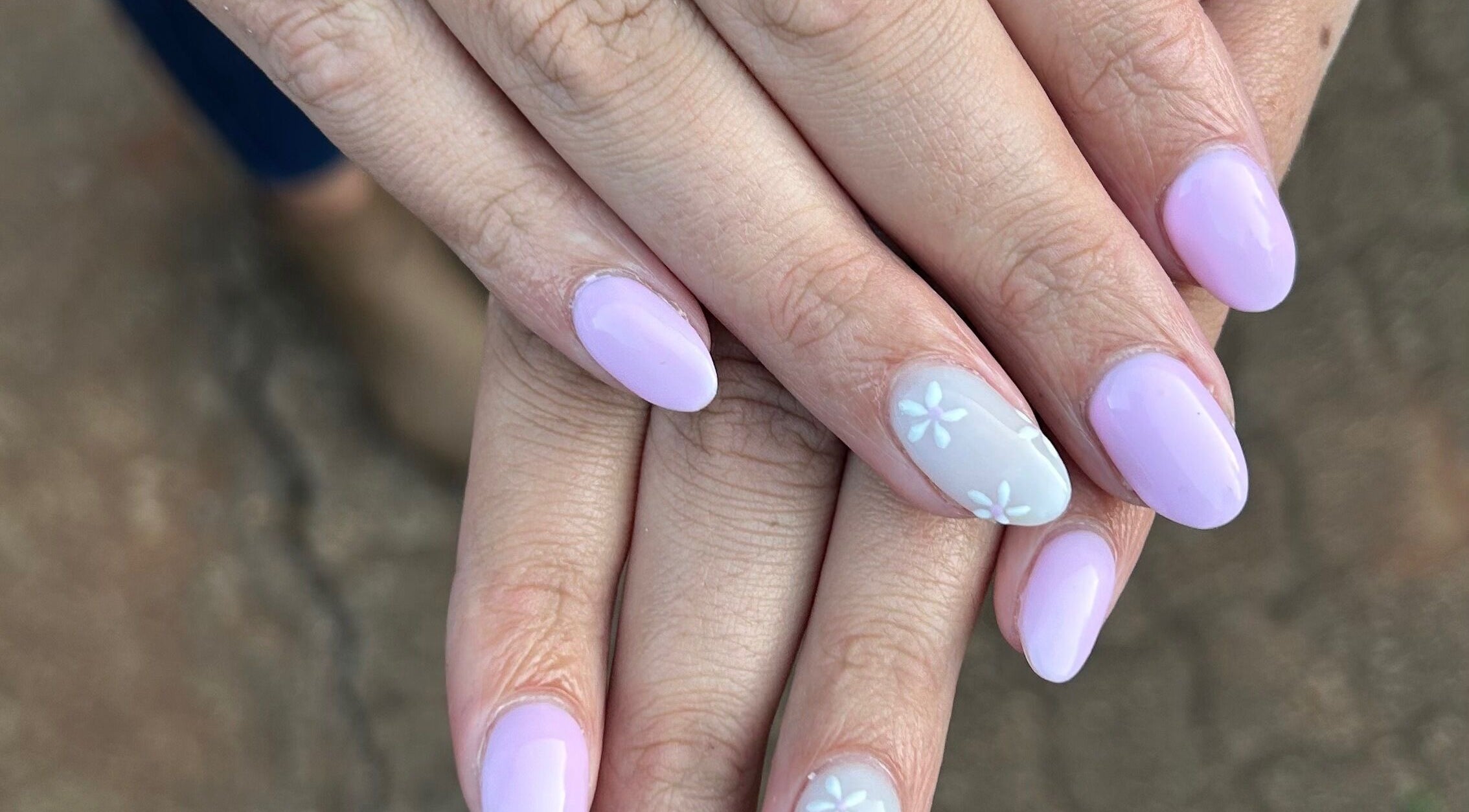 Stylish pastel nails at Blooming Nails, Tzaneen, Limpopo, ZA with delicate floral accents.