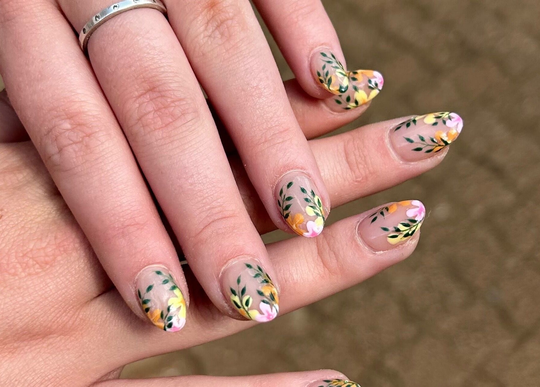 Intricate floral nails at Blooming Nails, Tzaneen, Limpopo, ZA. Vibrant design showcasing nail artistry.
