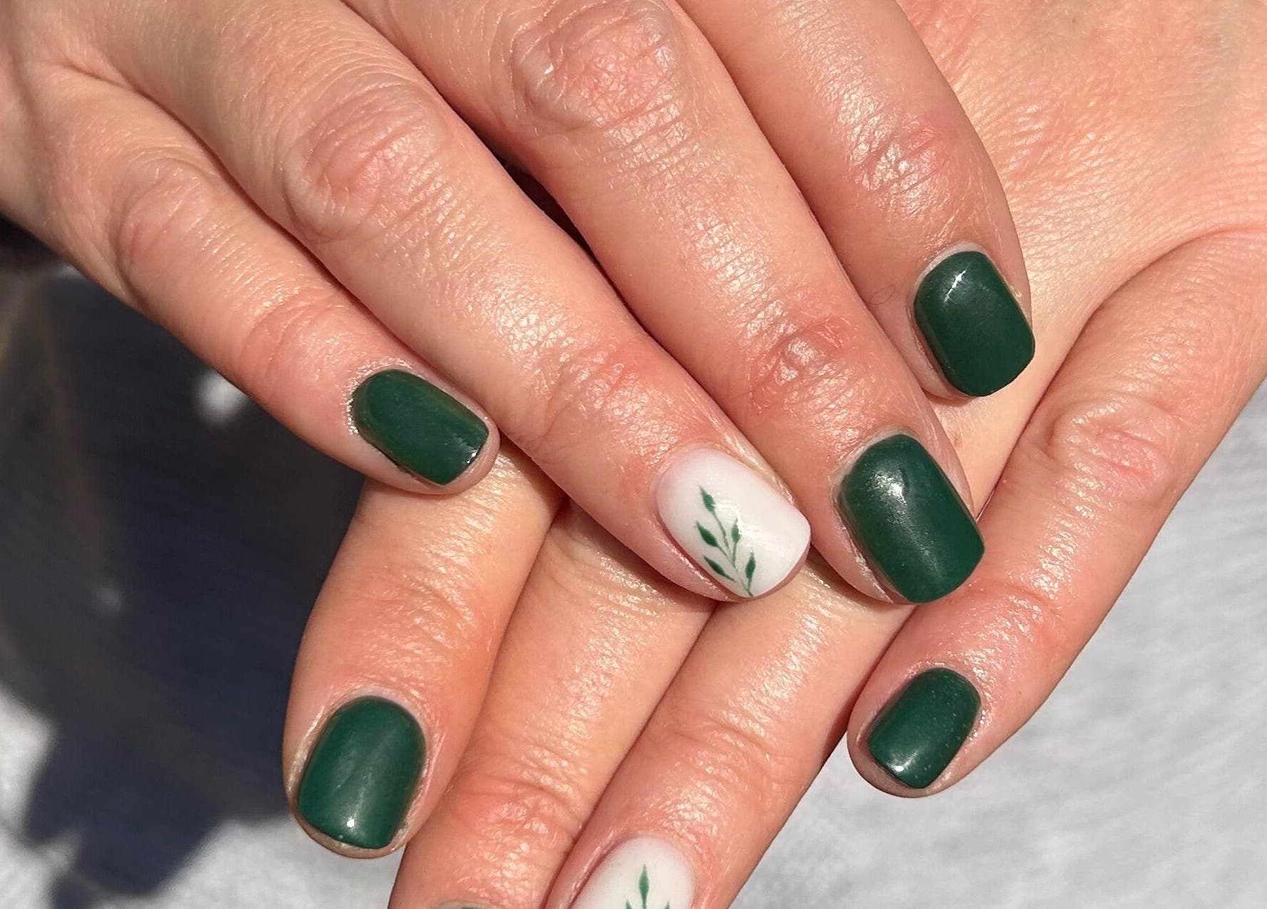 Stylish green nails with leaf design at Blooming Nails, Tzaneen, Limpopo, ZA.