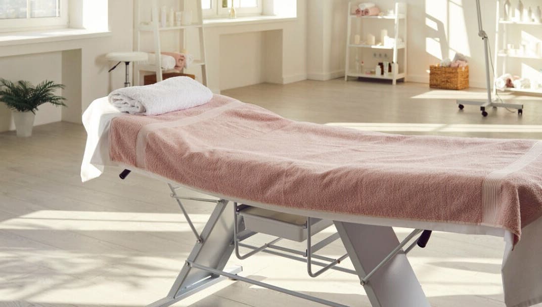 Tranquil treatment room at Rosemount Medical Clinic, Dublin, County Dublin, IE, with massage table and soft light.