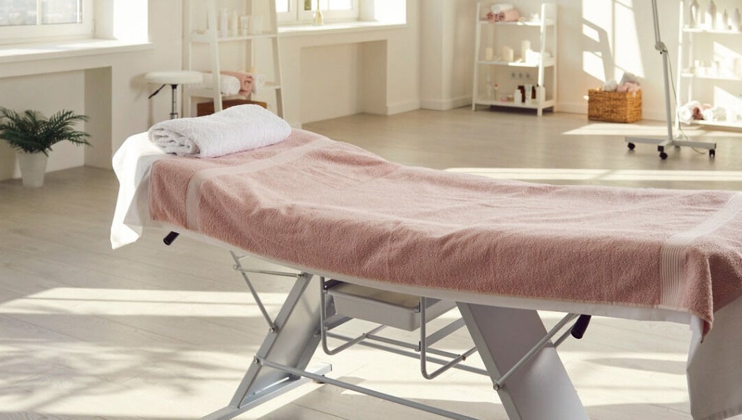 Tranquil treatment room at Rosemount Medical Clinic, Dublin, County Dublin, IE, with massage table and soft light.