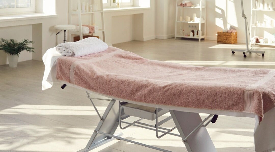 Tranquil treatment room at Rosemount Medical Clinic, Dublin, County Dublin, IE, with massage table and soft light.