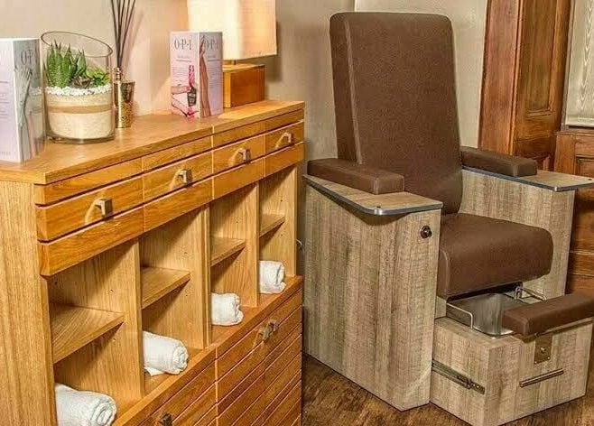 Cozy pedicure station at Park West Spa, Hamilton, Scotland, GB showcasing modern wooden decor.