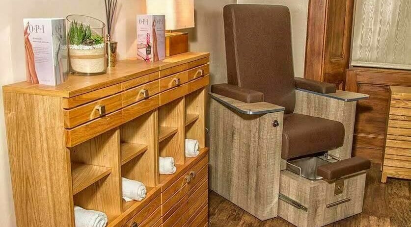 Cozy pedicure station at Park West Spa, Hamilton, Scotland, GB showcasing modern wooden decor.