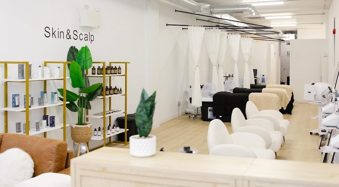 Dilaani Medical Aesthetics & Head Spa in Ottawa, Ontario, CA features stylish treatment chairs and skincare products.