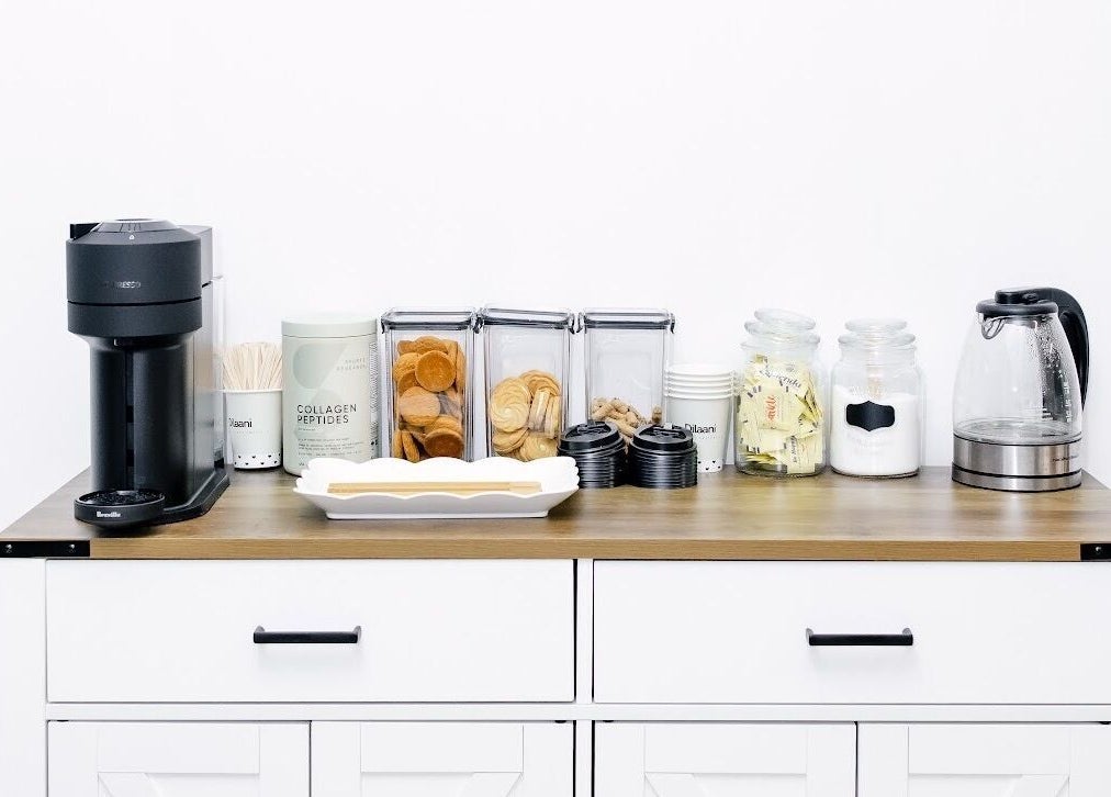 Inviting refreshment station at Dilaani Medical Aesthetics & Head Spa in Ottawa, Ontario, CA with hot drinks.