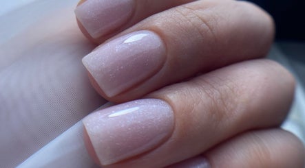 Close-up of glittery nude nails at Nails by Giulia, London, England, GB, showcasing expert nail artistry.