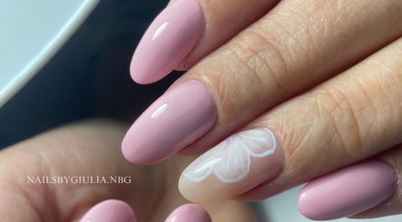Beautiful pink nails with floral design at Nails by Giulia, London, England, GB.