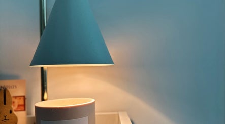 Elegant table lamp illuminating cozy corner at Nailsby Qj in Bandar Seri Begawan, BN.