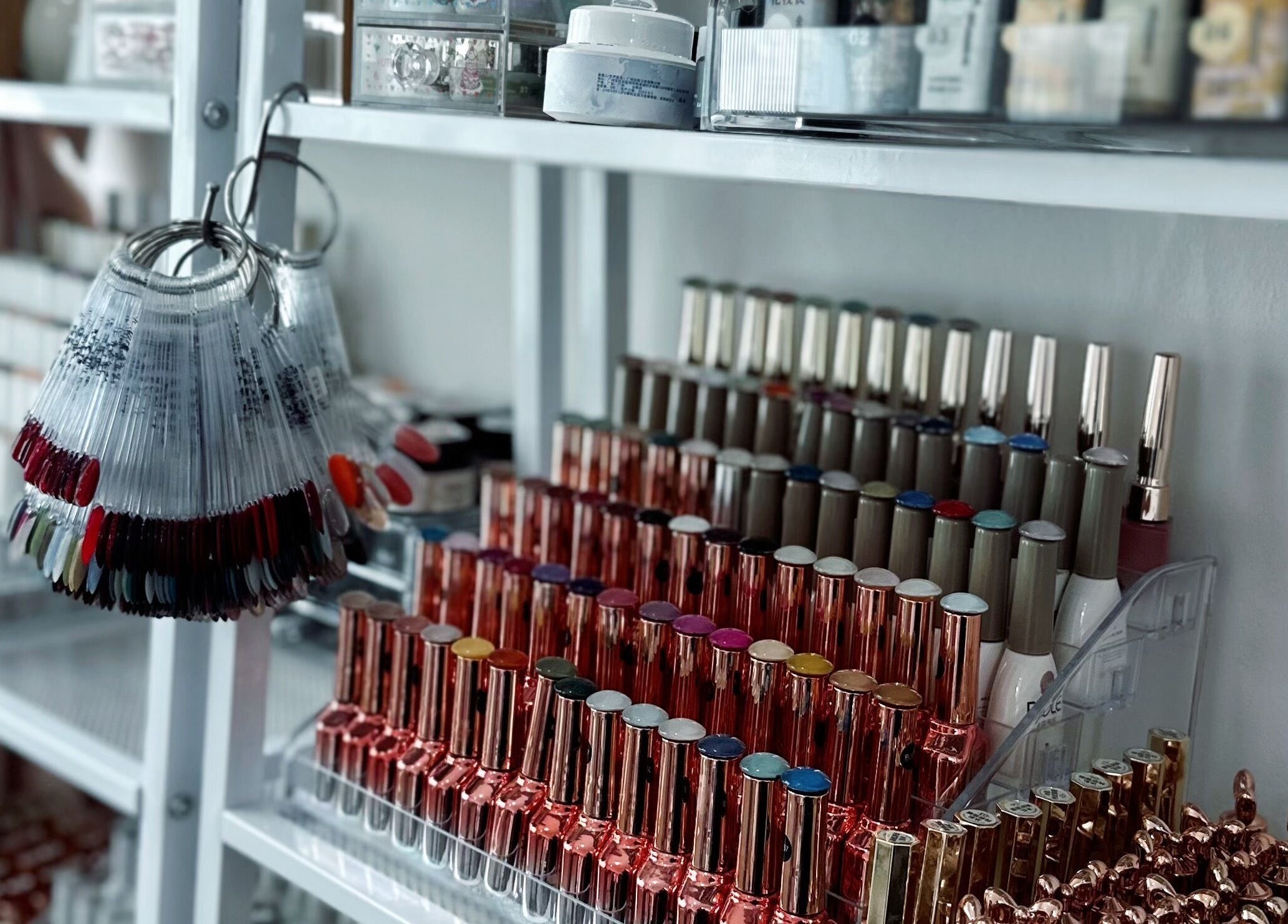 Nail polish bottles and color samples at Nailsby Qj, Bandar Seri Begawan, BN.