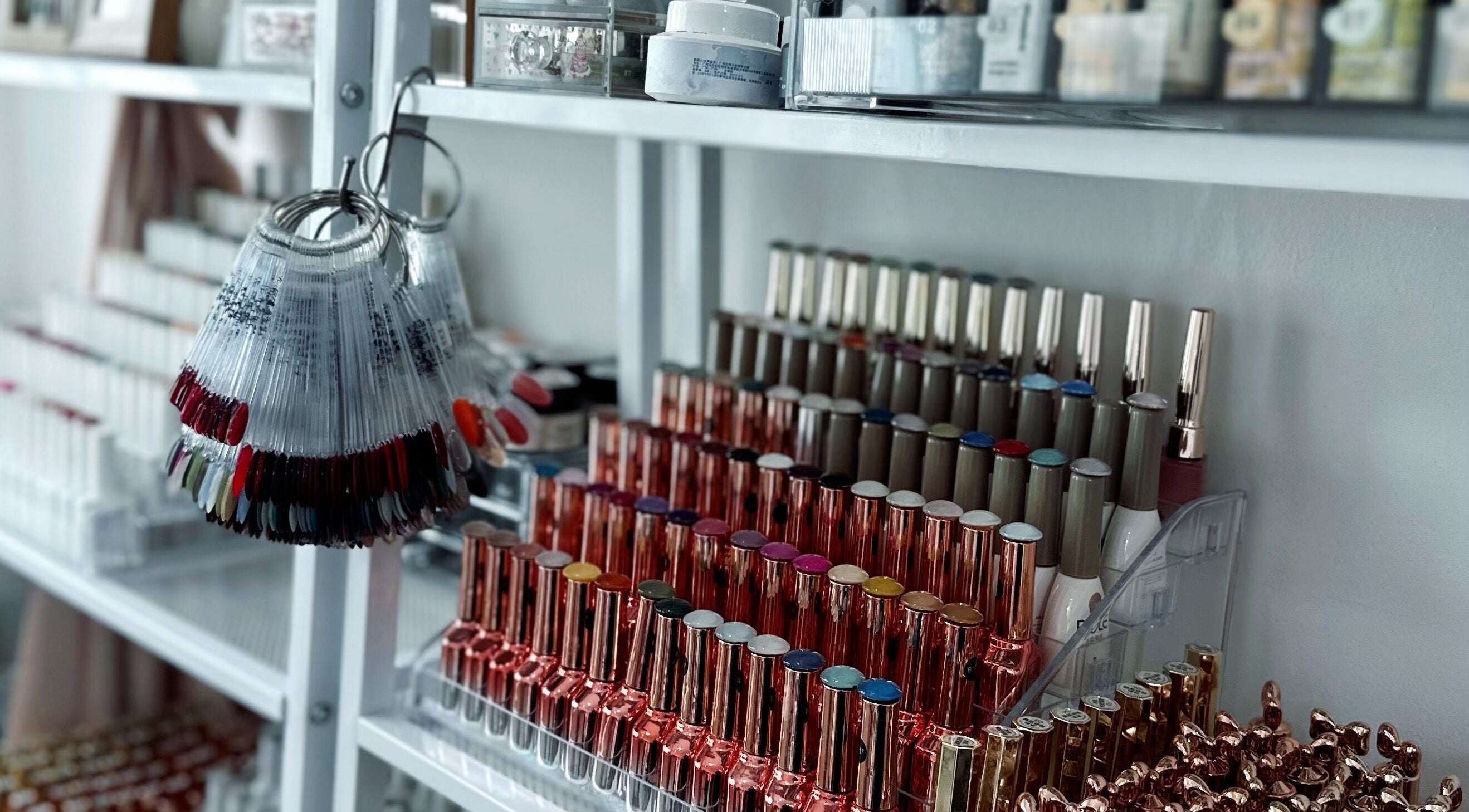 Nail polish bottles and color samples at Nailsby Qj, Bandar Seri Begawan, BN.