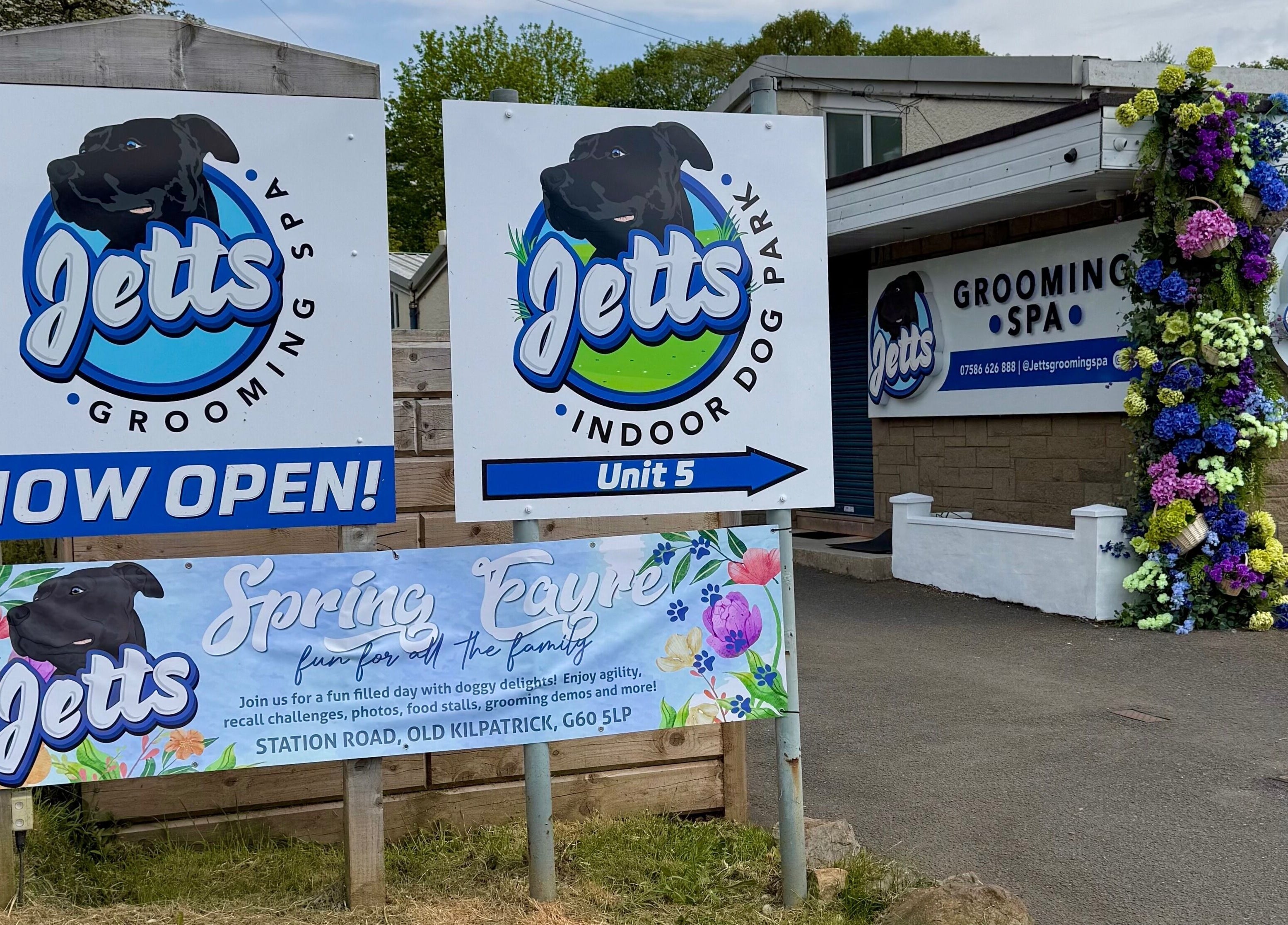 Entrance of Jetts Wash showing signs, located in Glasgow, Scotland, GB.