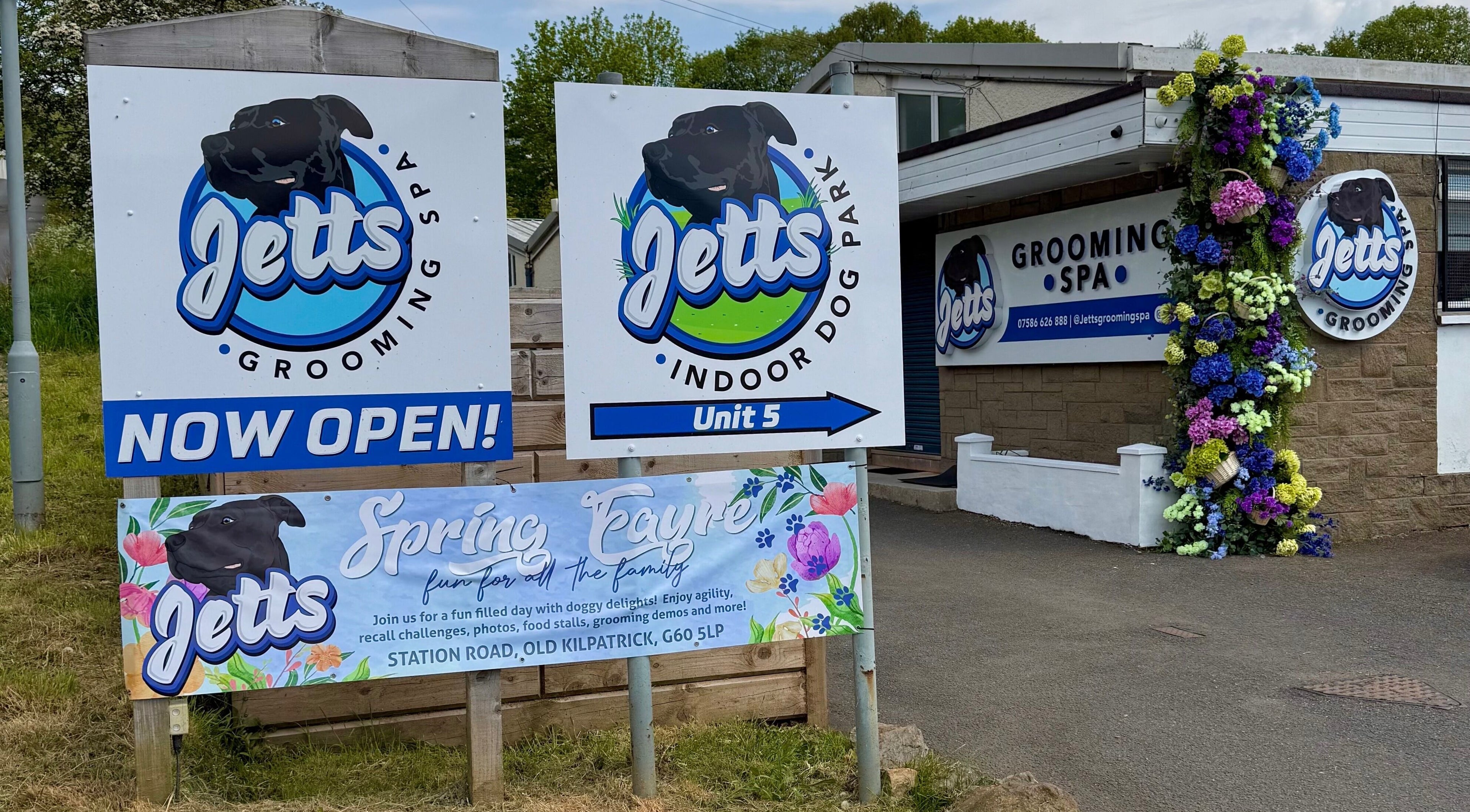 Entrance of Jetts Wash showing signs, located in Glasgow, Scotland, GB.