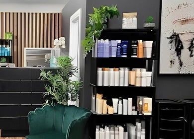 Modern interior of Quick Cuts in Prospect, Tasmania, AU featuring sleek shelving and stylish decor.
