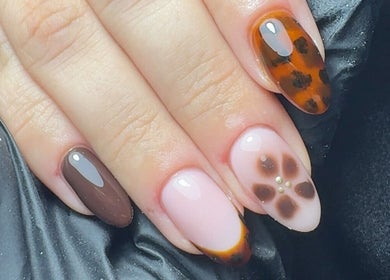 Stylish autumn-themed nail art at CE BEAUTY STUDIO in Southampton, England, GB.