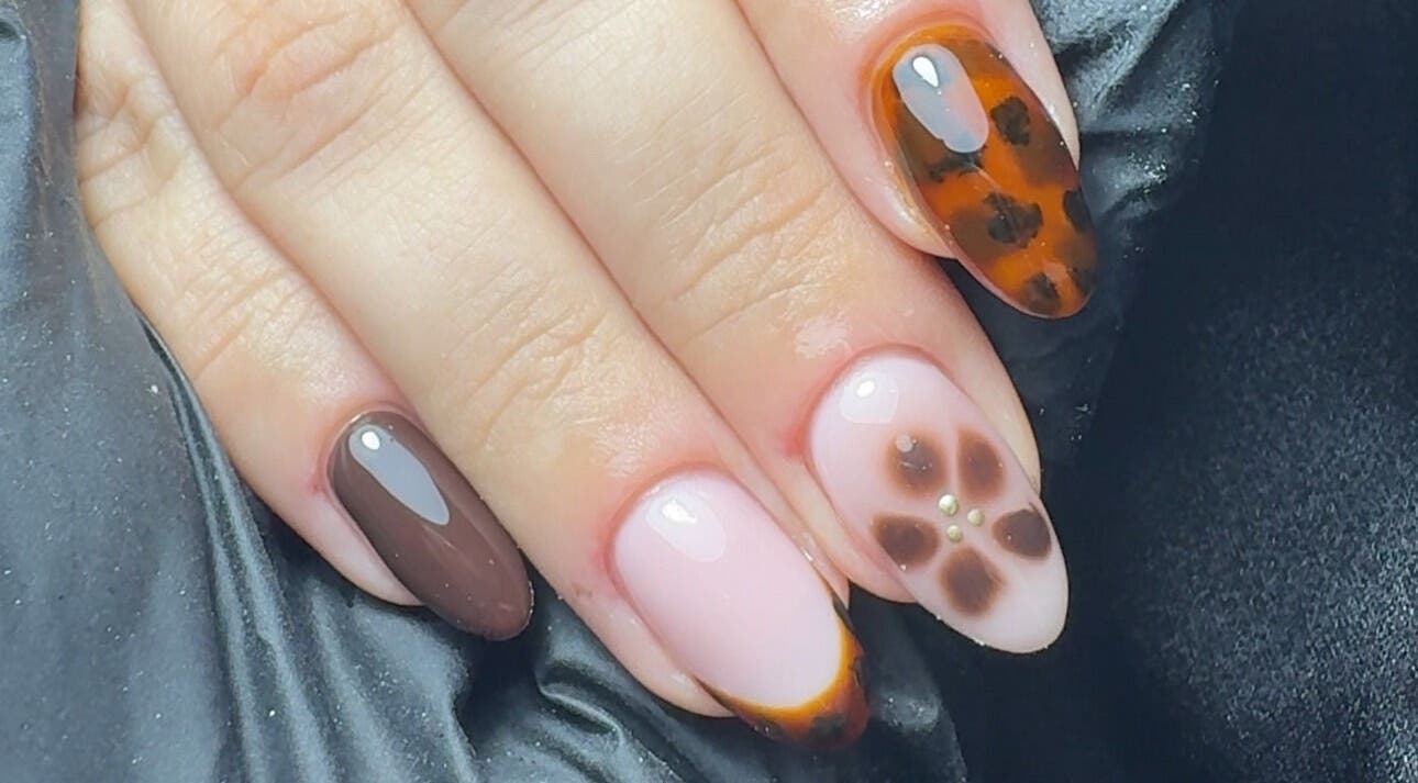 Stylish autumn-themed nail art at CE BEAUTY STUDIO in Southampton, England, GB.