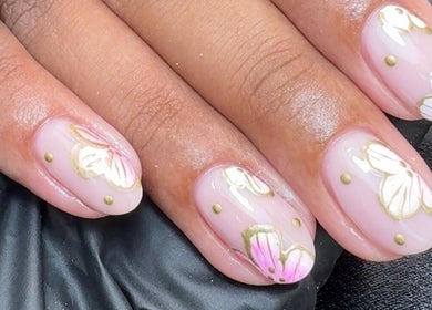 Close-up of pink floral nail art at CE BEAUTY STUDIO, Southampton, England, GB.