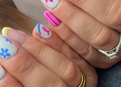 Vibrant nail art with nautical designs by CE BEAUTY STUDIO, Southampton, England, GB.