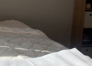 Relaxing treatment bed at Dolled Up By Lily in Kelmscott, Western Australia, AU, inviting a calm wellness experience.