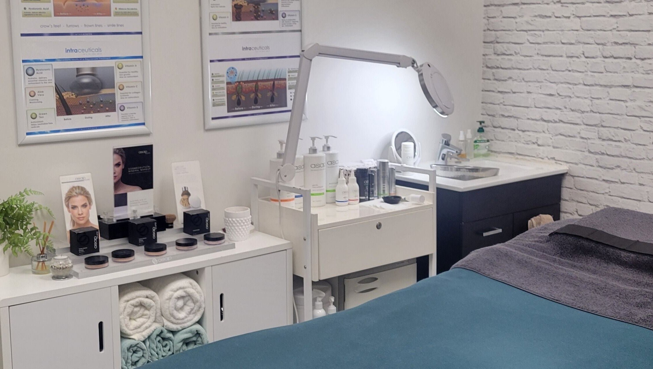 R&R Skin Care Clinic's serene treatment room in Auckland, NZ, featuring products and clean relaxation area.