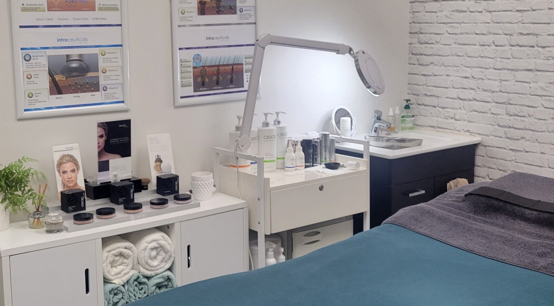 R&R Skin Care Clinic's serene treatment room in Auckland, NZ, featuring products and clean relaxation area.