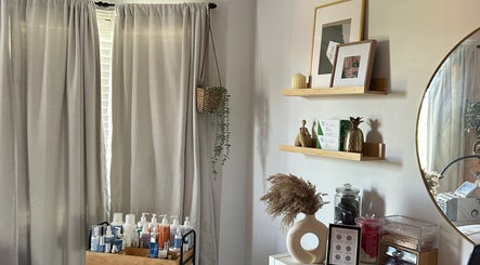 Calming skincare display at Glow Girl Esthetics in Mississauga, Ontario, CA with products and decor.